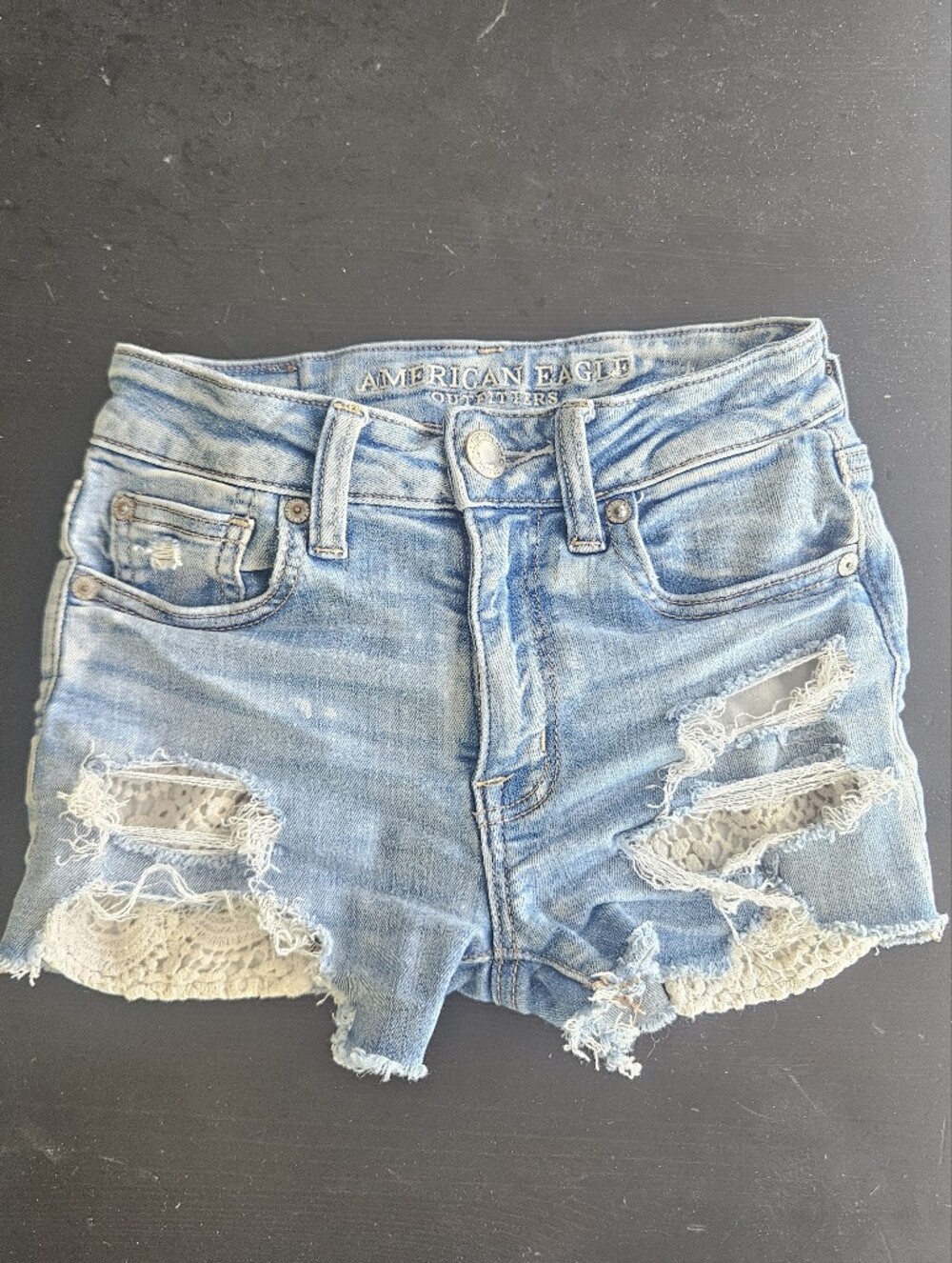 Distressed Light Wash Jean Shorts